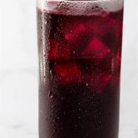 Small Sorrel · House blend of Jamaican (Hibiscus) Sorrel and fresh ginger. 16 ounces