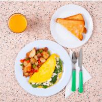 Greek Omelette · Three egg omelette with spinach, feta, tomato, served with buttered toast and your choice of...