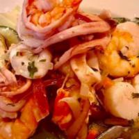 Shrimp Salad · Grilled shrimp over baby spinach with grilled asparagus, roasted peppers, tomatoes, onion, c...