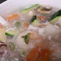 Seafood Soup · Fish broth with scallop, shrimp, crabmeat, fish cake and veggie.