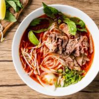 Mystery Spicy Phó Noodle Soup · Choice of different beef, served with beef broth, onions, scallions. With lemon, basil and b...