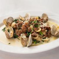 Orecchiette Pasta With Clams & Sausage · White clam sauce opened little necks with Italian sweet sausage.