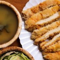 Dinner Chicken Katsu · Breaded and fried, served with grilled vegetables and katsu sauce on the side. Served with s...
