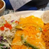 Cheese Enchiladas · Two corn tortillas filled with cheddar cheese, topped with onions, chile ancho or green toma...