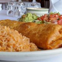 Chimichanga · Flour tortilla stuffed with shredded Beef or shredded Chicken quick-fried served with guacam...