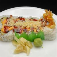 Spicy Shrimp Tempura Roll · Eight pieces.Shrimp tempura and avocado with sweet spicy sauce and tempura flakes on top.