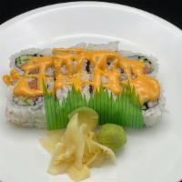 Spicy Salmon Roll · Eight pieces. Salmon, cucumber with spicy mayo on top. Raw.