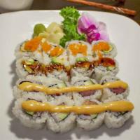 Nice Combo · 16 pieces. Tobiko roll, eel roll, spicy tuna, spicy salmon roll. Raw.