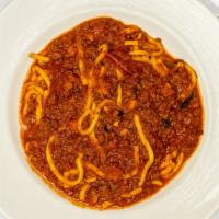 Spaghetti Alla Chitarra Bolognese · Homemade spaghetti in a hearty meat sauce.