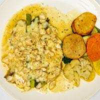 Vitello Imperatori · Veal medallions sautéed with asparagus, crab meat, fresh herbs, white wine sauce and melted ...