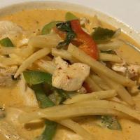 Red Curry · Red curry paste, bamboo shoots, bell pepper, fresh basil in thai coconut milk. Served with j...