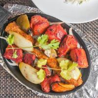 Kebab Platter · Marinated in a mix of ginger, garlic, lemon juice, spices and seasoning, cooked in a clay ov...