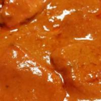 Butter Chicken · Succulent pieces of chicken cooked in clay oven and served in traditional butter sauce.