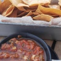 Roasted Tomato Salsa & Chips · Chunky, mild tomato salsa