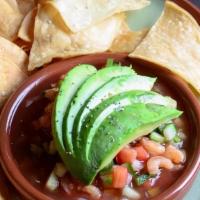 Shrimp Ceviche · Fresh shrimp cooked and mixed with tomatoes, cucumber, red onion, cilantro, Serrano chili, C...