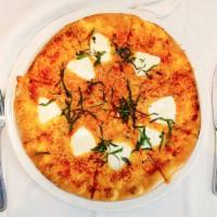 Margherita Pizza · tomato sauce, shredded mozzarella cheese, fresh mozzarella, basil