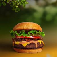 Vegan Virtuoso Burger · Seasoned vegan plant-based patty topped with your favorite choice of toppings! Served on a b...