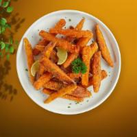 Potato Plot Fries · (Vegetarian) Thick-cut sweet potato wedges fried until golden brown