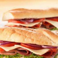 The Hemenway · Hot ham, salami, mortadella, provolone cheese with lettuce, tomatoes, onion and hot peppers,...