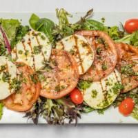 Caprese Salad · tomato, fresh mozzarella, basil, olive oil.