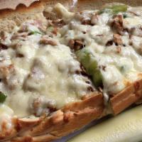 Vegetarian Cheesesteak · Veggie lean steak with fried onions and green peppers.