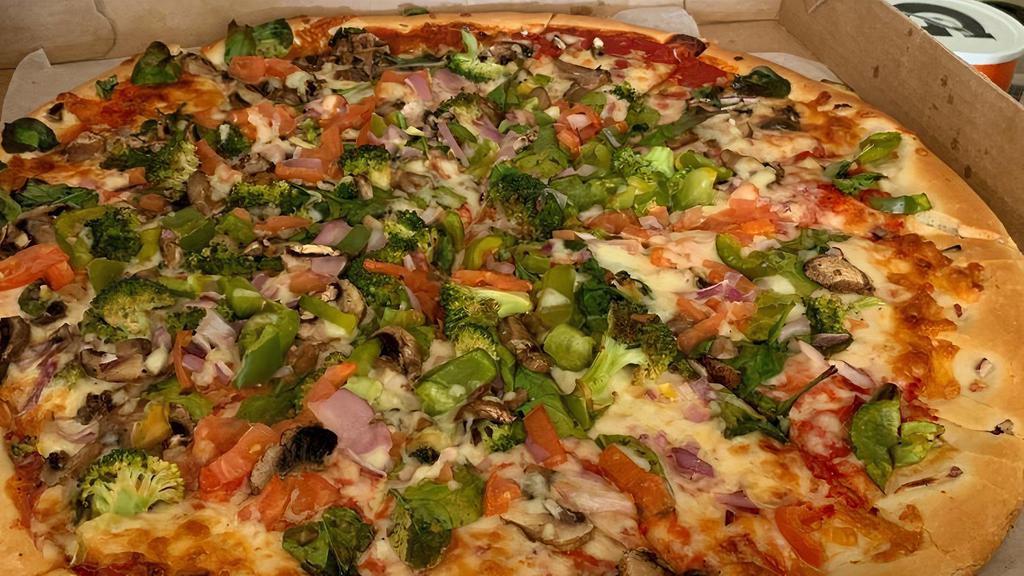 Vegetable Pizza · Spinach, mushrooms, onions, green peppers,  tomato and broccoli.