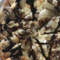 Holy Roller Pizza · White base with Brie, caramelized onions, mushrooms and balsamic glaze.