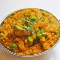 Baingan Bharta · Eggplant baked over an open flame, mashed and seasoned with garlic and spices and then sauté...