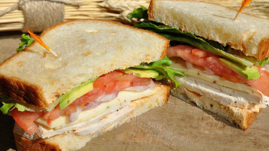 Chihuahua · Roasted chicken, pepperjack, avocado, lettuce, tomato, onion, chipotle mayo, cheddar bread.
