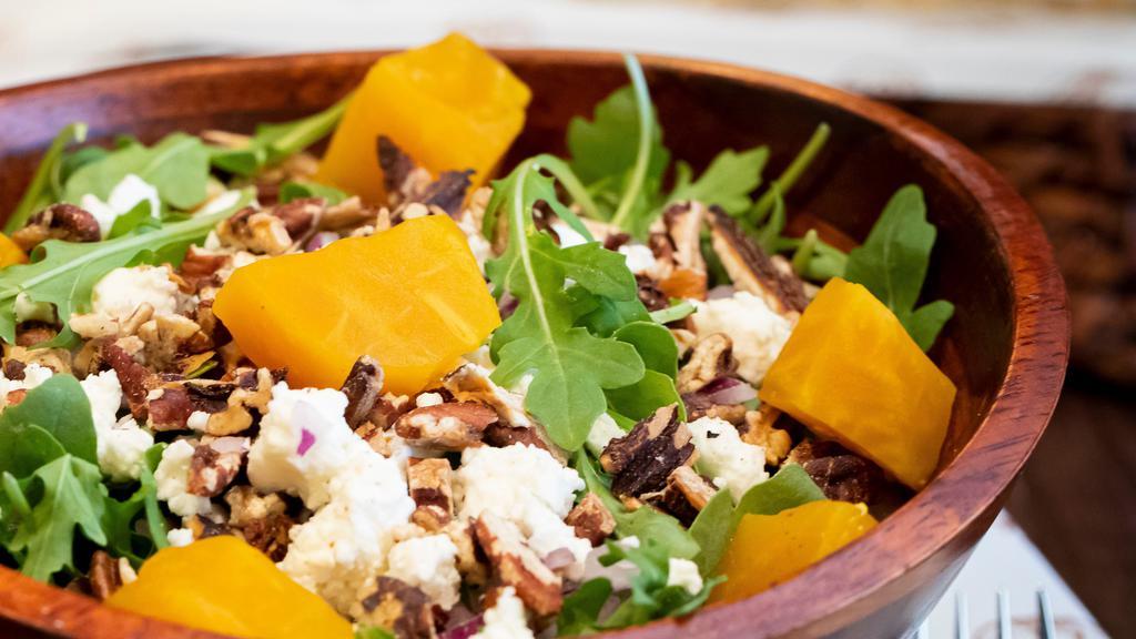 Golden Beet · Arugula, roasted golden beets, goat cheese, roasted pecans, red onion, curry vinaigrette.
Vegetarian