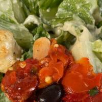 Caesar Salad · Crisp romaine with homemade Caesar dressing, croutons and parmesan cheese.