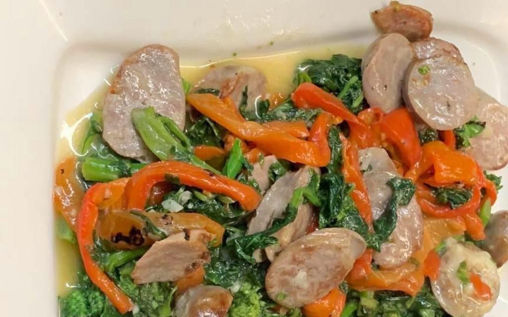 Broccoli Rabe & Roasted Peppers With Sausage · Sauteed in a garlic white wine sauce.