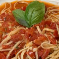Pasta Italiano · Linguini tossed with fresh chopped plum tomatoes in garlic white wine.