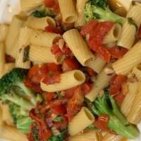 Rigatoni & Broccoli · Fresh broccoli and sundried tomatoes tossed in a garlic white wine with pinenuts and plum to...