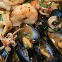 Zuppa Di Pesce · Fresh clams, mussels, calamari and shrimp in a marinara sauce or garlic white wine sauce ove...