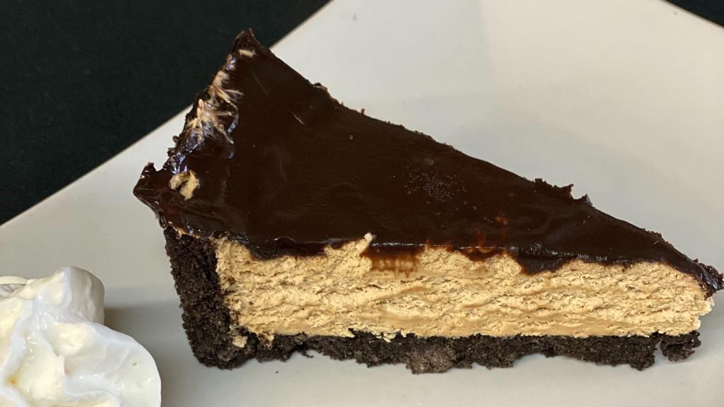 Cappuccino Mousse Cake · Cappuccino infused mousse topped with a rich chocolate ganache over an Oreo crust