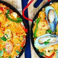 Seafood Paella · Authentic Spanish rice dish studded with mix seafood and chef's secret ingredients. Serves 2...