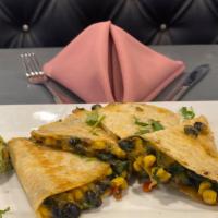 Vegetarian Quesadilla · Veggies quesadillas loaded with bean, corn, bell pepper, cilantro, spices and lots of cheese...