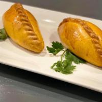 Empanadas  · Two stuffed chicken or beef made 3321 style, served with homemade salsa side.
