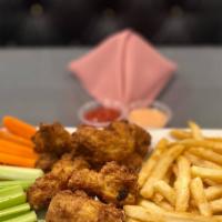 Chicken Wing · Served with carrots and celery stick with choice of blue cheese or ranch sauce (BBQ, lemon p...