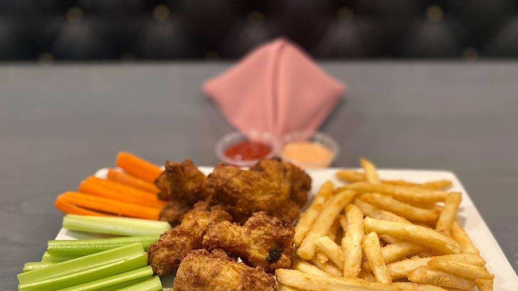 Chicken Wing · Served with carrots and celery stick with choice of blue cheese or ranch sauce (BBQ, lemon pepper, asian zing) and a side of fries.