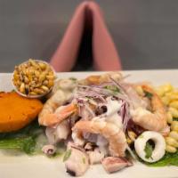 Ceviche Mixto / Seafood Ceviche · Fish marinated & mix seafood 3321 bistro style in citrus juice, cilantro, peppers and spices...