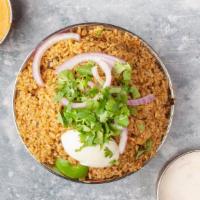 Thalapakattu Chicken Biryani · Basmati Rice cooked with Chicken on Dum over slow heat marinated with fresh herbs, spices an...