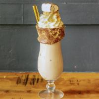 Nutella S'Mores · Toasted marshmallow, Nutella, graham cracker, whipped cream, beech smoke.