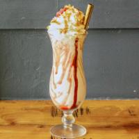 Banana Split · Strawberry, caramelized banana, chocolate sauce, caramel sauce, smoked sea salt, whipped cre...