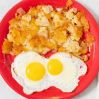 2 · Two eggs any style served with ham, home fries and toast.