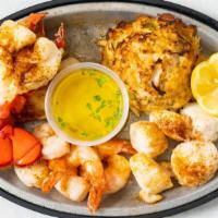 Broiled Seafood Combo · Jumbo shrimp, scallops, haddock and flounder stuffed with crabmeat, served with crab cake an...