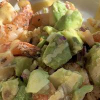 Grilled Shrimp · Served over rice with avocado salsa drizzled with curry-lime glaze.