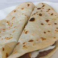 1 Orden De Balaeadas Con Huevo · Two handmade flour tortillas filled with beans, cheese, sour cream, and eggs.