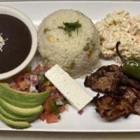 Churrasco Guatemalteco · Grilled steak, rice ,black refried beans, salad,avocado, jalapeno, spring onions and elbow s...